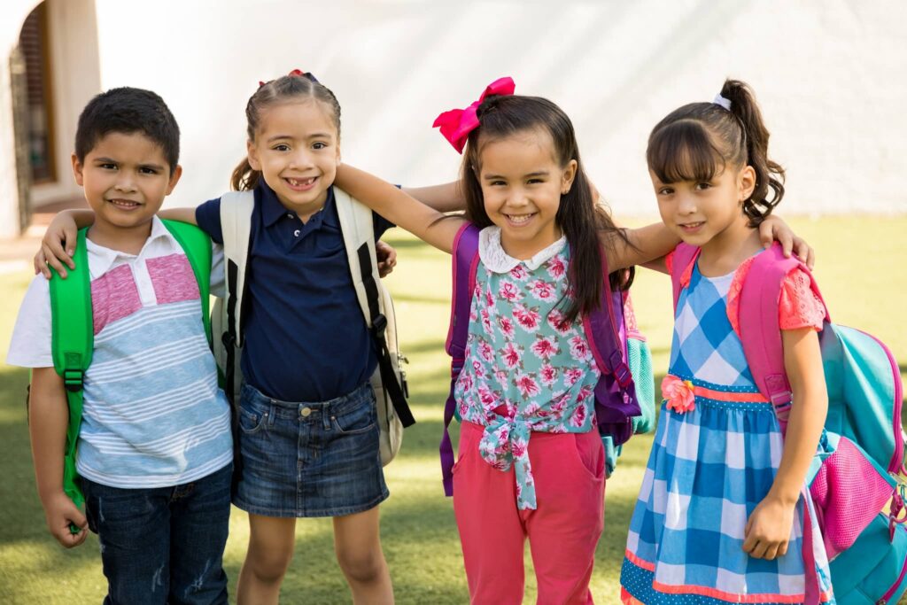 portrait group friends hanging out outdoors while going preschool together optimized